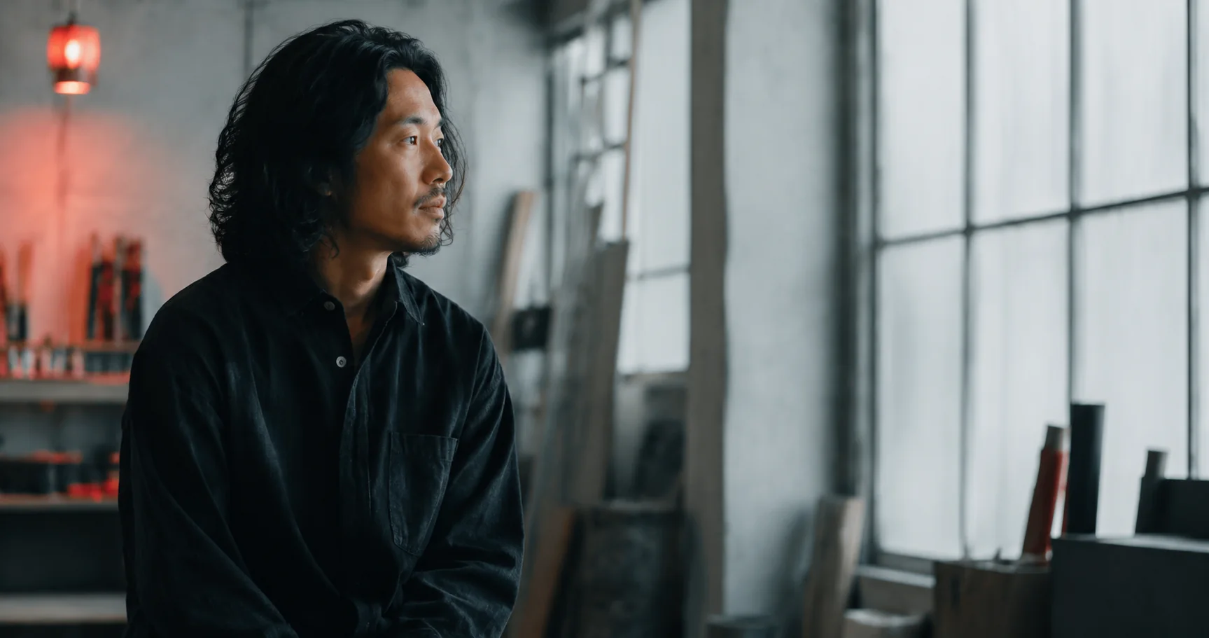 A confident person seen in a crisp, modern professional setting